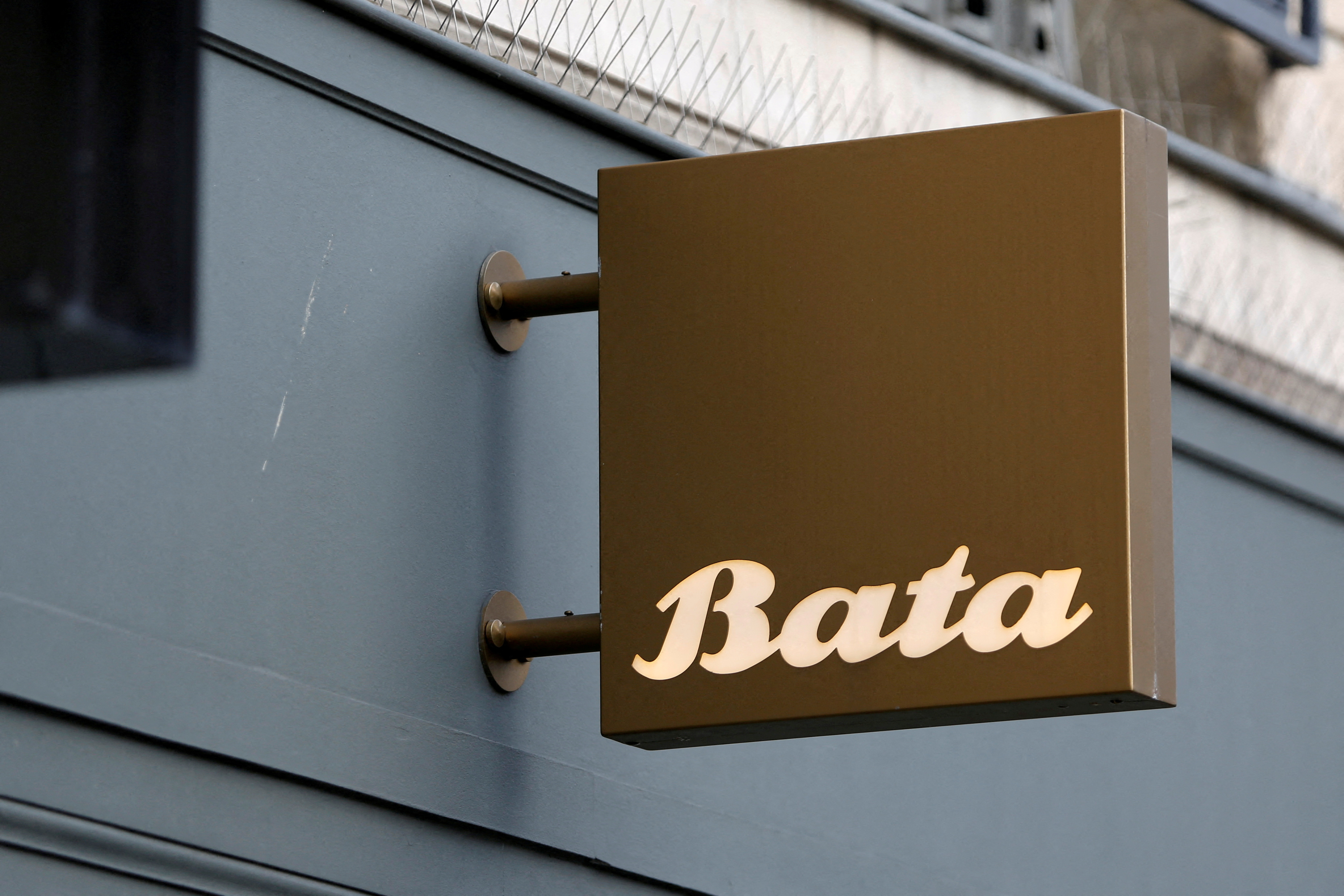 The logo of Bata shoes brand is pictured on a store in Paris